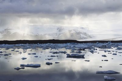 Scenic view of snow covered lake