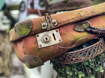 Close-up of rusty metal on wood