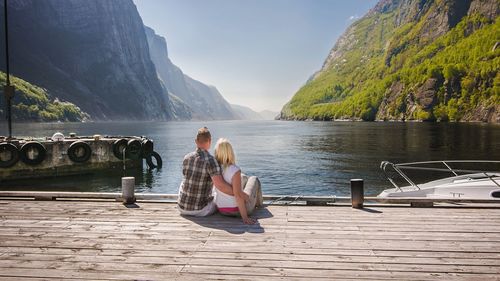 People relaxing on mountain