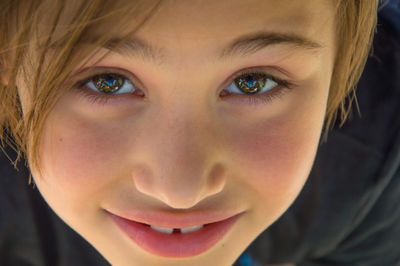 Extreme close-up portrait of smiling girl