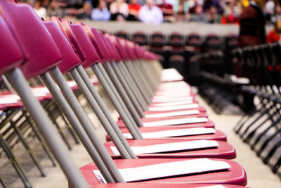 Empty chairs arranged at stadium