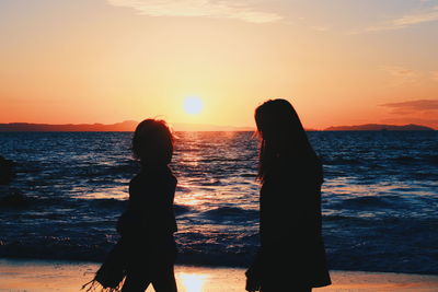 Scenic view of sea at sunset