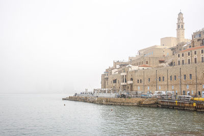 Old jaffa port and tel-aviv in fog time