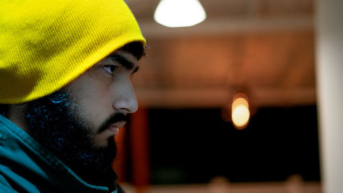 Portrait of young man looking away