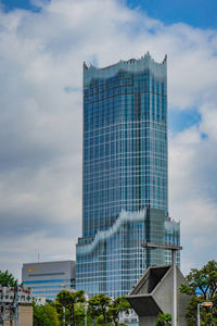 Low angle view of skyscrapers against sky