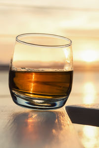 Close-up of beer in glass on table