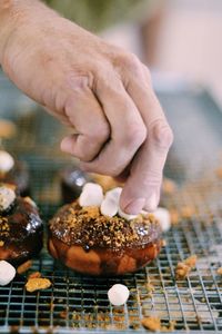 Close-up of person preparing food