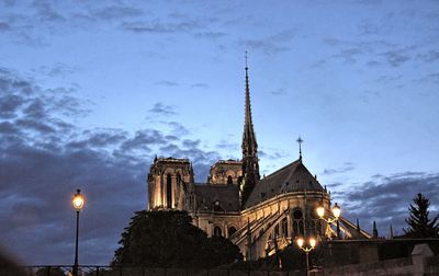 Low angle view of cathedral against cloudy sky