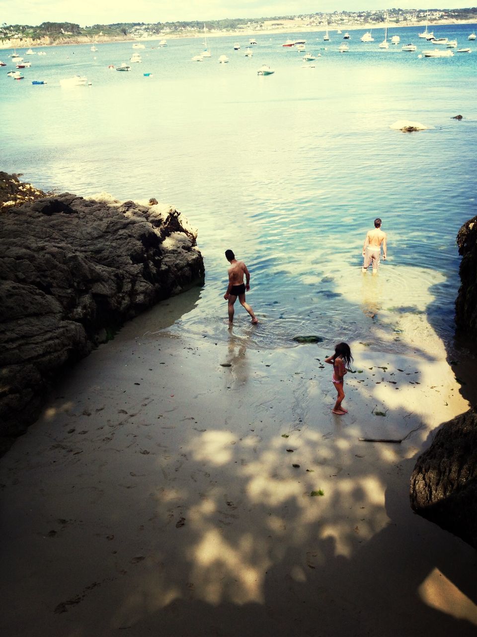 water, sea, beach, shore, leisure activity, lifestyles, vacations, sand, togetherness, horizon over water, men, high angle view, enjoyment, person, nature, wave, summer, reflection, medium group of people