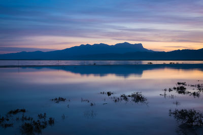 A rare sight of the salt flats in guadalupe mountain national park flooding with a colorful sky