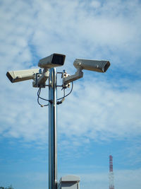 Cctv camera viewed from a low angle 