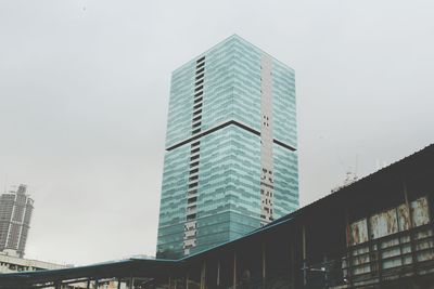 Low angle view of skyscrapers against sky