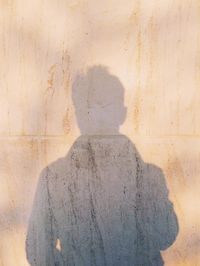 Shadow of people on wall
