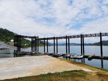 Bridge over river against sky