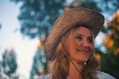 Portrait of a smiling young woman in snow