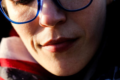 Close-up of woman wearing eyeglasses