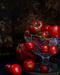 Close-up of tomatoes in basket on table