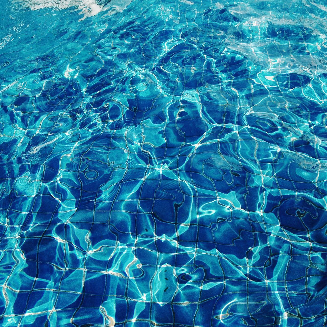 full frame, backgrounds, water, blue, pattern, rippled, high angle view, nature, natural pattern, beauty in nature, close-up, sea, no people, transparent, textured, day, outdoors, swimming pool, tranquility, waterfront