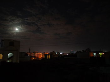 View of illuminated buildings at night