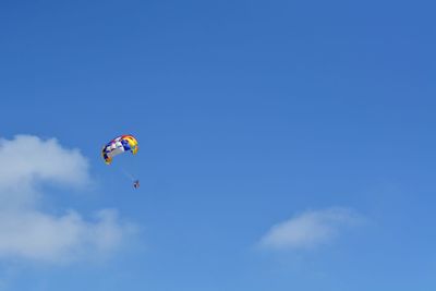 Low angle view of kite flying in sky