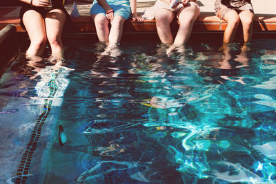 Low section of woman in water