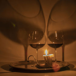 Close-up of tea light candles on table