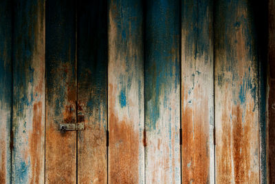 Full frame shot of weathered wooden plank