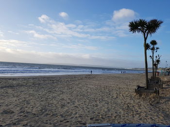 Scenic view of beach against sky