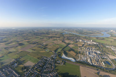 Aerial view of agricultural field against sky