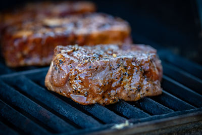 Close-up of meat on barbecue grill