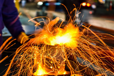 Close-up of illuminated firework display at night