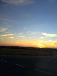 Scenic view of landscape at sunset