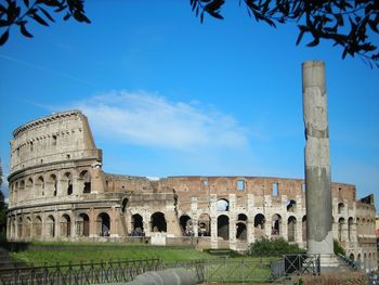 Coliseum old ruins against sky
