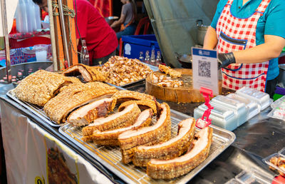 Midsection of man preparing food