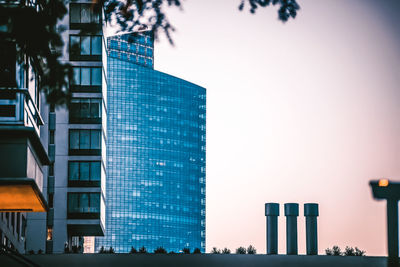 Low angle view of modern buildings against sky