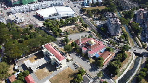 High angle view of street amidst buildings in city