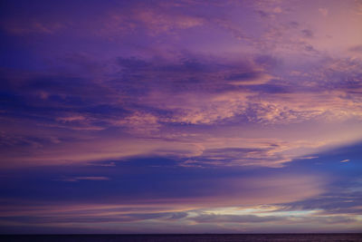 Low angle view of dramatic sky during sunset