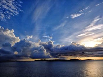 Scenic view of sea against cloudy sky