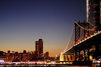 Illuminated city buildings at night