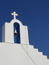 Low angle view of church against sky during sunny day