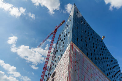 Low angle view of built structure against blue sky