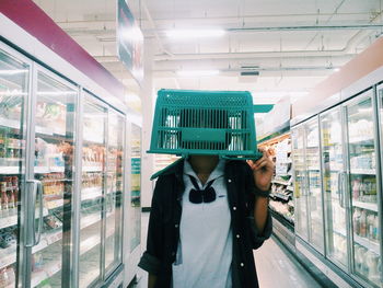 Full length of woman standing in store