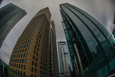 Low angle view of skyscrapers against sky