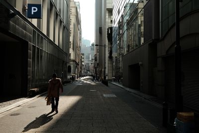 People walking on street in city