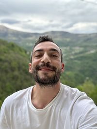 Smiling ice against to mountains 