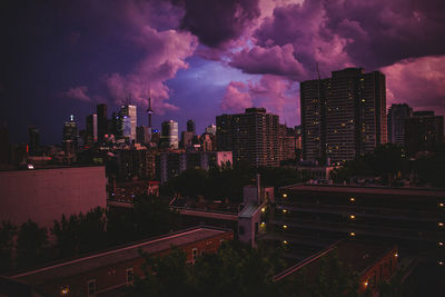 Panoramic view of buildings against sky at night