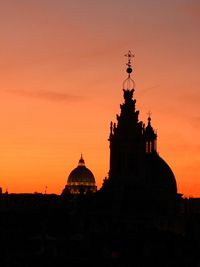 Silhouette temple against sky during sunset