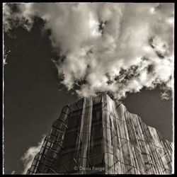 Low angle view of modern building against sky