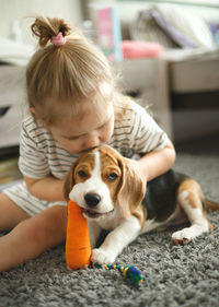 Woman with dog at home