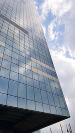 Low angle view of skyscraper against sky